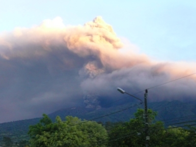 Turrialba Volcano in action behind the clouds; seen from the road to San Diego